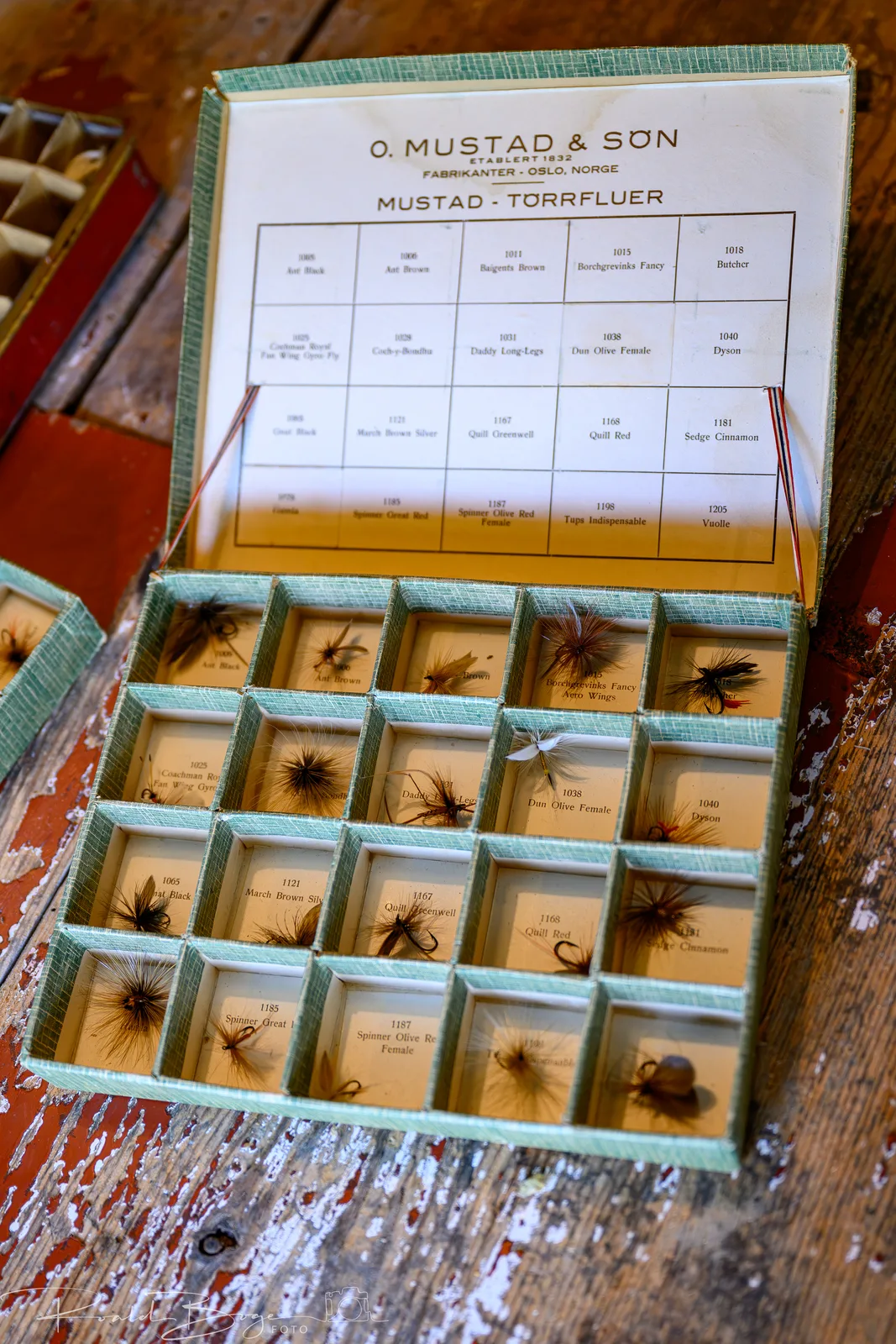 Classic fly box with a salmon fly