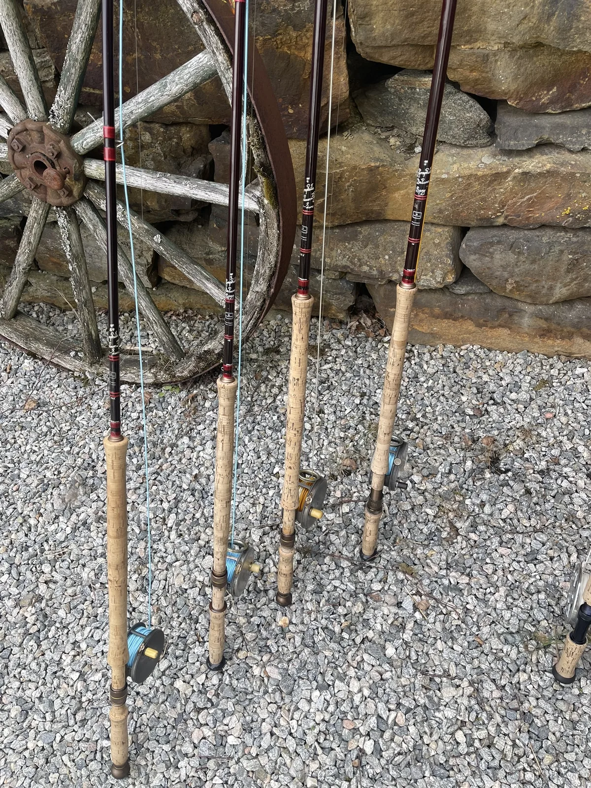 Fly rods against a stone wall